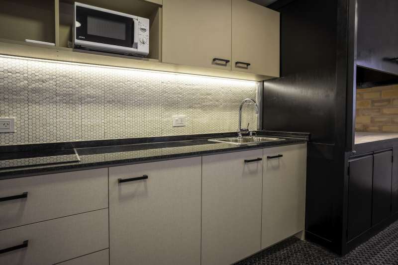 Scimaca / Arquitectura y construcción espacio laboral Comedor y Vestuarios